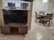 Open living area with a TV and view into dining area at 14950 W Mountain View Blvd # 1111, Surprise, AZ 85374