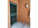 Private condo entrance with a teal security door at 14950 W Mountain View Blvd # 1111, Surprise, AZ 85374