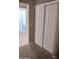 Bedroom with closet and sliding doors at 14950 W Mountain View Blvd # 1111, Surprise, AZ 85374