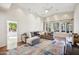 Bright living room with large windows and comfortable seating at 5302 E Mercer Ln, Scottsdale, AZ 85254