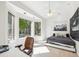Bright bedroom with window seat and backyard view at 5302 E Mercer Ln, Scottsdale, AZ 85254