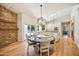 Bright kitchen with white cabinets, granite countertops, and a spacious island at 5302 E Mercer Ln, Scottsdale, AZ 85254