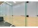 Private racquetball court with glass walls and hardwood floor at 7157 E Rancho Vista Dr # 5004, Scottsdale, AZ 85251