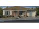 Charming one-story home with brick facade and two-car garage at 20490 E Via De Colina Pl, Queen Creek, AZ 85142