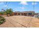 Large backyard with spacious patio and mature trees at 845 W Edgemont Ave, Phoenix, AZ 85007