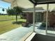 View of backyard and golf course from inside the house at 845 W Edgemont Ave, Phoenix, AZ 85007