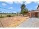 Large backyard with patio and golf course view at 845 W Edgemont Ave, Phoenix, AZ 85007