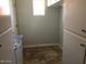 Laundry room with built-in shelving and cabinets at 845 W Edgemont Ave, Phoenix, AZ 85007