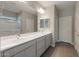 Double vanity bathroom with modern fixtures and tile flooring at 2869 N Coronado Dr, Florence, AZ 85132