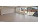 Spacious living room with tile floors and sliding glass doors at 2869 N Coronado Dr, Florence, AZ 85132