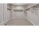 Spacious walk-in closet with ample shelving and hanging space at 2869 N Coronado Dr, Florence, AZ 85132