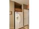 White refrigerator with wood cabinets above in kitchen at 9833 E Gemini Pl, Sun Lakes, AZ 85248