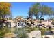 Fountain Hills community entrance with waterfall feature and signage at 17025 E La Montana Dr # 107, Fountain Hills, AZ 85268