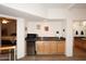 Convenient wet bar with a microwave, mini-fridge, and sink at 17025 E La Montana Dr # 107, Fountain Hills, AZ 85268