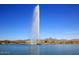 Tall fountain in lake with mountain view in background at 17025 E La Montana Dr # 107, Fountain Hills, AZ 85268