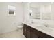 Double vanity bathroom with shelving and toilet at 4657 N 177Th Ln, Goodyear, AZ 85395