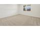 Spacious bedroom featuring carpet and a window at 4657 N 177Th Ln, Goodyear, AZ 85395
