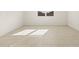 Bright bedroom with tile floor and large window at 4657 N 177Th Ln, Goodyear, AZ 85395