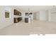 Open concept kitchen with island and dark brown cabinets at 4657 N 177Th Ln, Goodyear, AZ 85395