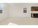 Bright and airy living room with tile flooring and large windows at 4657 N 177Th Ln, Goodyear, AZ 85395