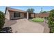 Backyard with putting green and paver walkway at 41333 N Belfair Way, Anthem, AZ 85086