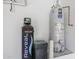 Mechanical room with water softener and water heater at 41333 N Belfair Way, Anthem, AZ 85086