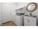 Laundry room with washer, dryer, and utility sink at 41333 N Belfair Way, Anthem, AZ 85086