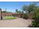 Backyard with putting green and desert landscaping at 41333 N Belfair Way, Anthem, AZ 85086