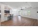 Open living area with hardwood floors and access to backyard at 41333 N Belfair Way, Anthem, AZ 85086