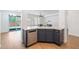 Kitchen island with sink and dishwasher, features dark blue cabinets at 41333 N Belfair Way, Anthem, AZ 85086