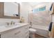 Clean bathroom with bathtub, toilet, and updated vanity at 41333 N Belfair Way, Anthem, AZ 85086