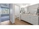 Bright bathroom boasts double sinks, a toilet, and access to a bedroom at 41333 N Belfair Way, Anthem, AZ 85086
