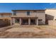 Large backyard with gravel and covered patio at 42959 W Arizona Ct, Maricopa, AZ 85138