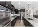 Modern kitchen with stainless steel appliances and granite countertops at 19826 W Lincoln St, Buckeye, AZ 85326