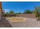 Landscaped backyard with gravel and a grassy area at 19826 W Lincoln St, Buckeye, AZ 85326