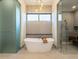 Spa-like bathroom with soaking tub and walk-in shower at 37200 N Cave Creek Rd # 1005, Scottsdale, AZ 85262