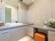 Bathroom with dual sinks and a stylish vanity at 37200 N Cave Creek Rd # 1005, Scottsdale, AZ 85262