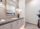 Elegant powder room with a modern vanity and vessel sink at 37200 N Cave Creek Rd # 1005, Scottsdale, AZ 85262