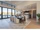 Bright dining room features a large table, modern chairs, and sliding doors leading to a patio at 37200 N Cave Creek Rd # 1005, Scottsdale, AZ 85262