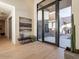 Light-filled entryway with hardwood floors and modern decor at 37200 N Cave Creek Rd # 1005, Scottsdale, AZ 85262