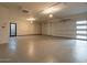 Large garage with epoxy flooring and high ceilings at 37200 N Cave Creek Rd # 1005, Scottsdale, AZ 85262