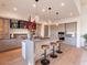 Modern kitchen with a large island, stainless steel appliances, and custom cabinetry at 37200 N Cave Creek Rd # 1005, Scottsdale, AZ 85262