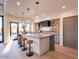 Contemporary kitchen boasts a large island, sleek countertops, and ample cabinet storage at 37200 N Cave Creek Rd # 1005, Scottsdale, AZ 85262