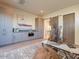 Multipurpose room with kitchenette and sliding barn door at 37200 N Cave Creek Rd # 1005, Scottsdale, AZ 85262