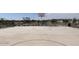 Outdoor basketball court with benches and landscaping at 24232 W Bowker St, Buckeye, AZ 85326