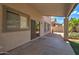 Covered patio with sliding glass door access from inside at 7216 W Irma Ln, Glendale, AZ 85308