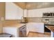 Kitchen corner with stainless steel sink and dishwasher at 7216 W Irma Ln, Glendale, AZ 85308