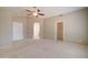 Large bedroom with two closets and neutral decor at 7216 W Irma Ln, Glendale, AZ 85308