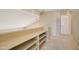 Linen closet and built-in shelving in the upstairs hallway at 7216 W Irma Ln, Glendale, AZ 85308