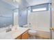 Clean bathroom with a tub shower combination, updated vanity, and neutral colors at 7216 W Irma Ln, Glendale, AZ 85308